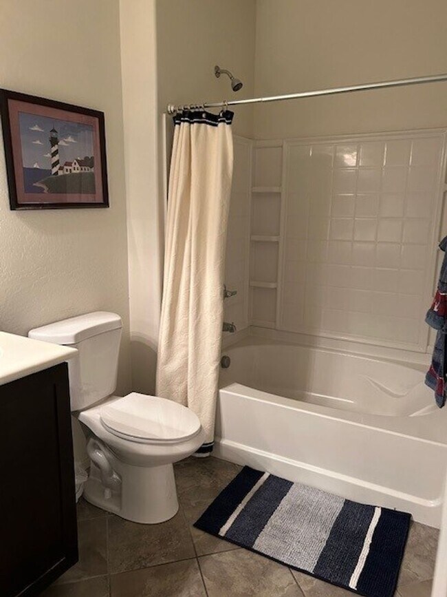 Building Photo - 2 bedroom /2 bath with a garage located in the  Popular Muirfield Village Townhomes