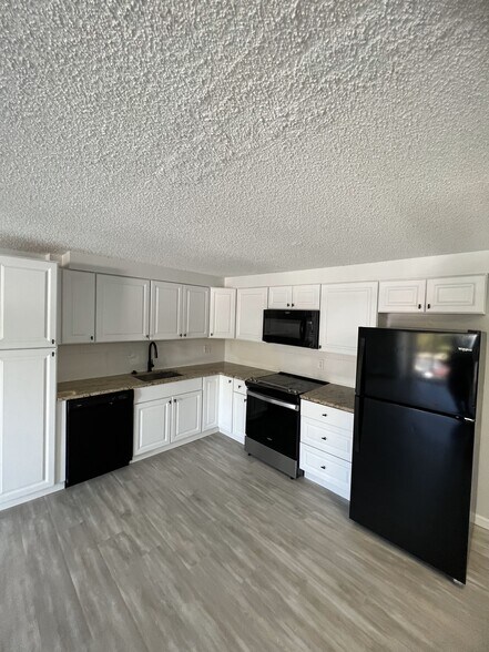Primary Photo - Village West Apartments