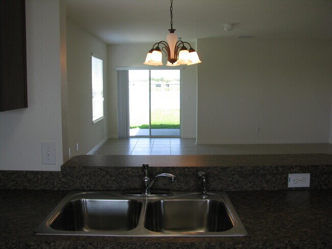 Building Photo - 3905 Flowering Orchid Ln