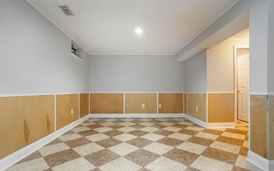 Finished Portion of Basement (Laundry Unit Not Pictured) - 218 Maple Wreath Ct