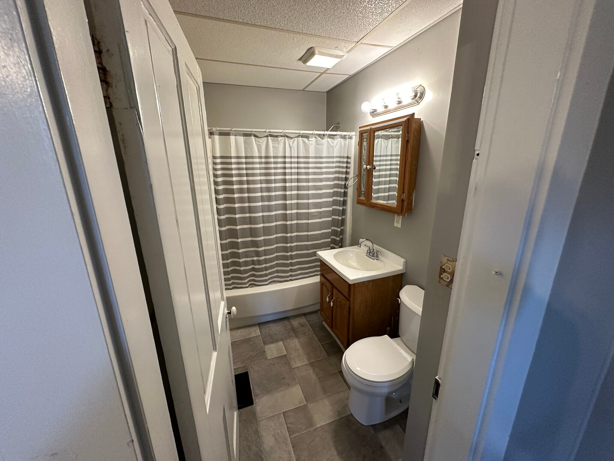 Full bathroom off of living room - 1508 Forest Ave