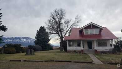 Building Photo - Beautiful craftsman style farmhouse outsid...