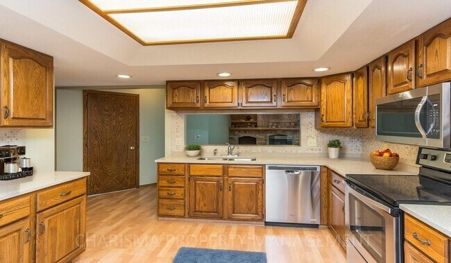 Building Photo - LARGE AND SPACIOUS, YET COZY AND QUAINT RANCH STYLE 4 BD, 3 BA HOUSE WITH DOUBLE ATTACHED GARAGE,...