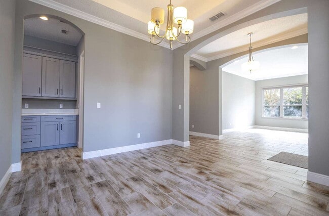 Building Photo - Spacious 4-Bed, 4-Bath Haven in Winter Garden – 3,388 Sq. Ft. of Comfort on Green Mountain Way