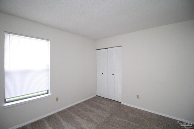 Building Photo - 6801 Tiki Ln