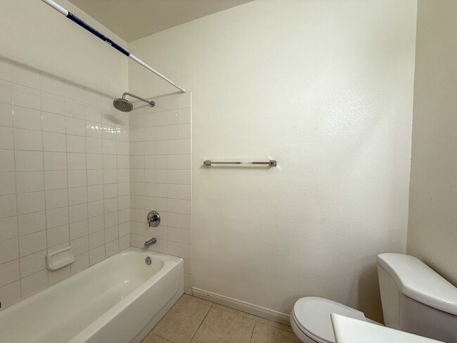 Building Photo - SPACIOUS HOME IN GATED COMMUNITY WITH POOL, RV PARKING & 4-CAR GARAGE!