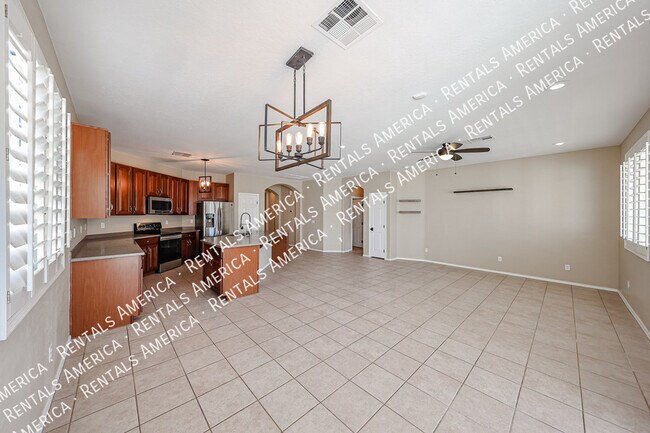 Building Photo - 14977 W Charter Oak Rd