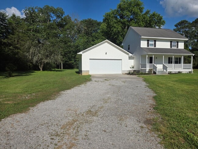 Building Photo - Peaceful Country Living with Modern Updates