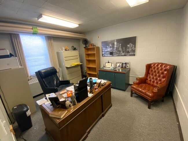 Building Photo - Furnished Loft-Style Apartment
