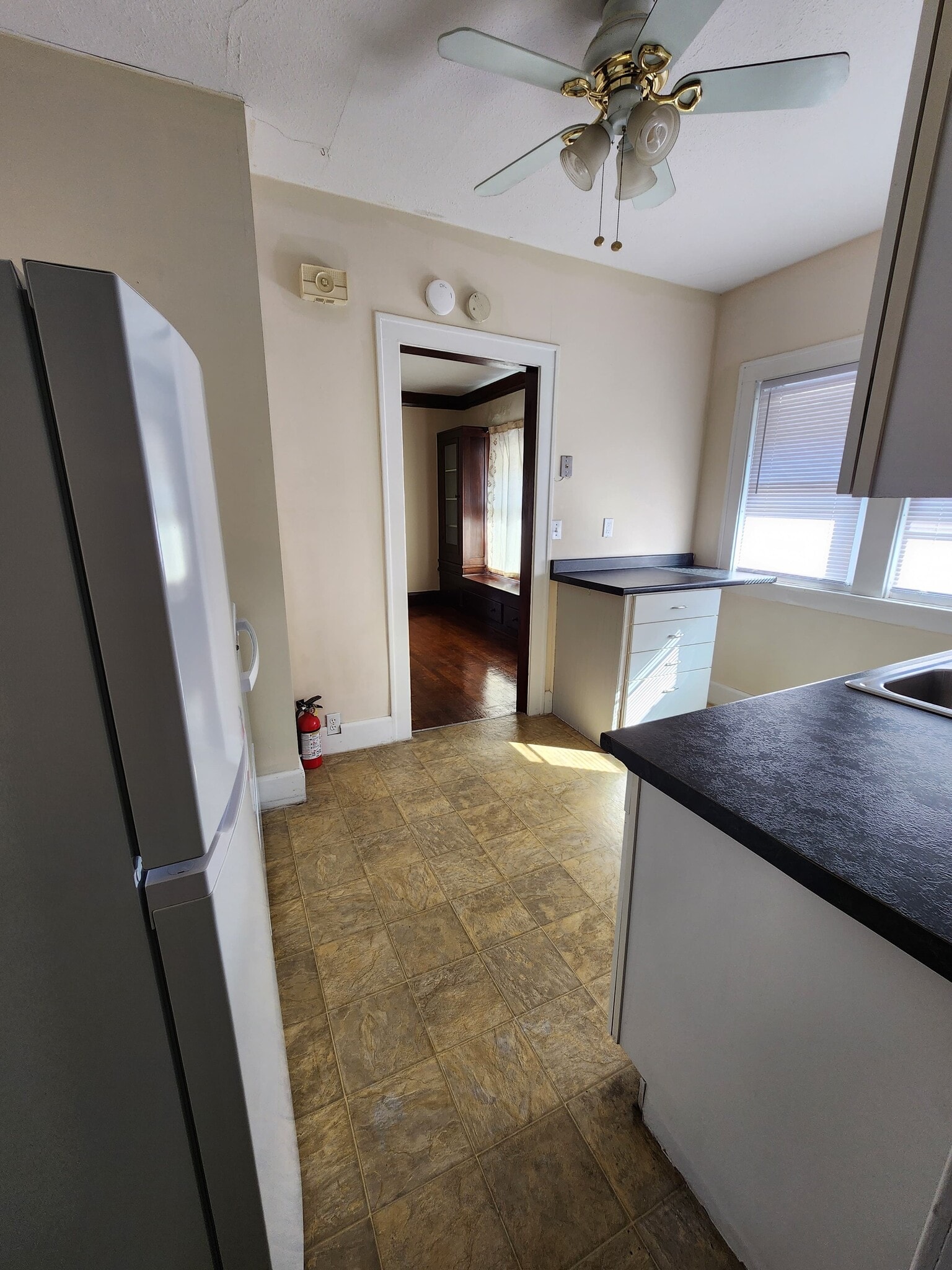 Kitchen with updated features and cabinets with dishwasher, fridge/freezer and range - 1382 Webb Rd
