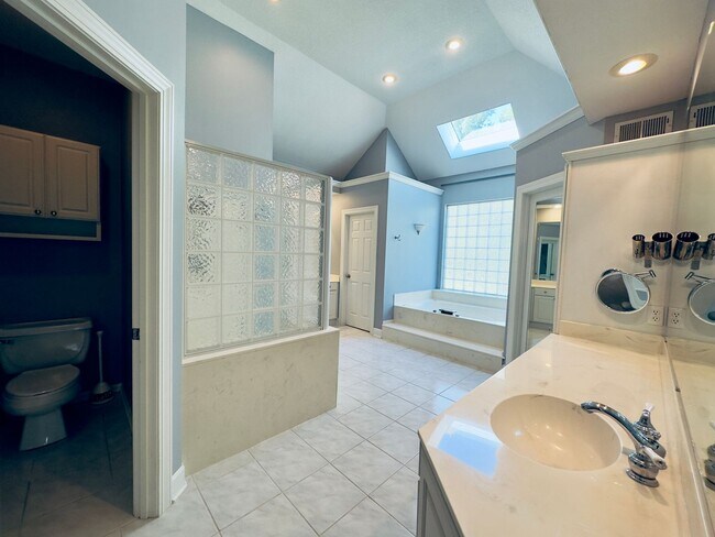 Building Photo - {6411} Enchanted Lake Estates + Updated Kitchen, Fresh Paint Throughout +  Main Floor Primary Bed...