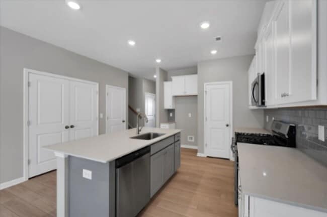 Building Photo - Stylish Living with Convenience at Your Doorstep
