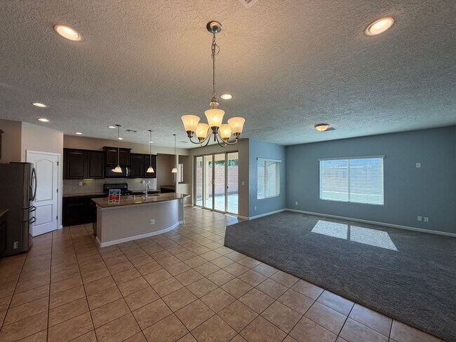 Building Photo - 4 Bedroom + Office Home Available Near Loma Colorado Blvd NE & Broadmoor Blvd NE in Rio Rancho!