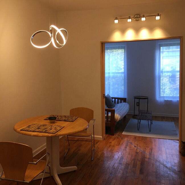 Dining nook looking into front living room - 726 Sackett St