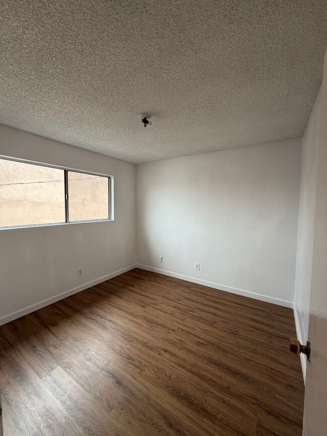 Building Photo - 3068 E Gage Ave