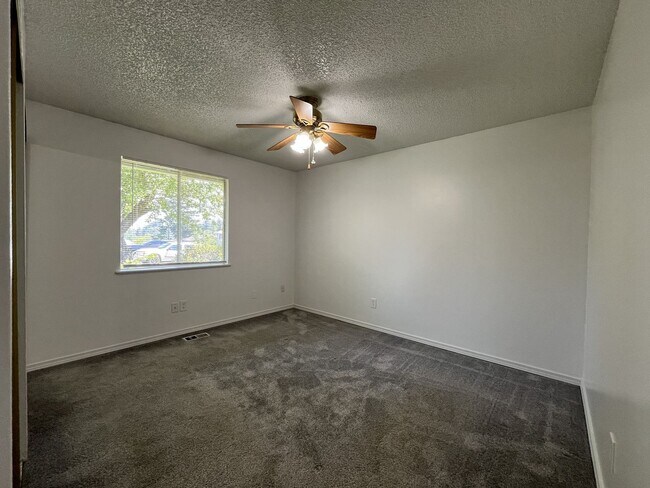 Building Photo - Charming Ranch Home with Sunroom or 4th Bedroom, Two-Car Garage and Fenced Backyard