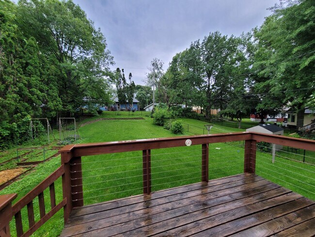 Building Photo - Coralville 4 bedroom 2.5 bath, 2 stall attached garage, fenced yard!