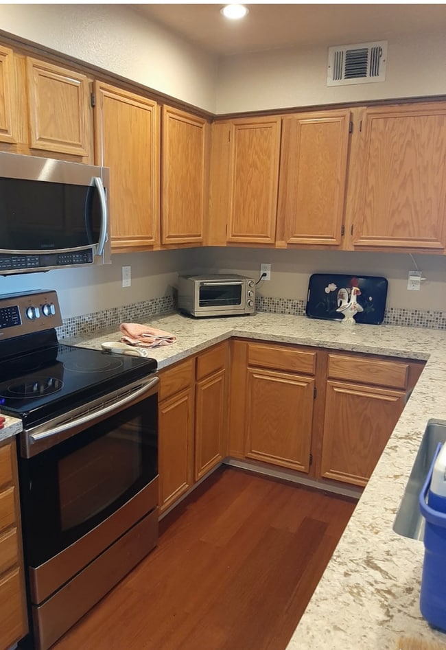 Building Photo - Fabulous Waterfront Condo with Private Boa...