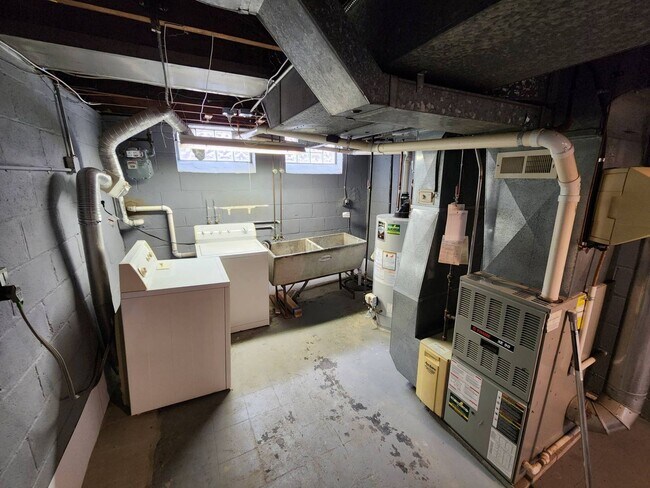 Building Photo - Move-In Special: Save $300 on This Charmin...