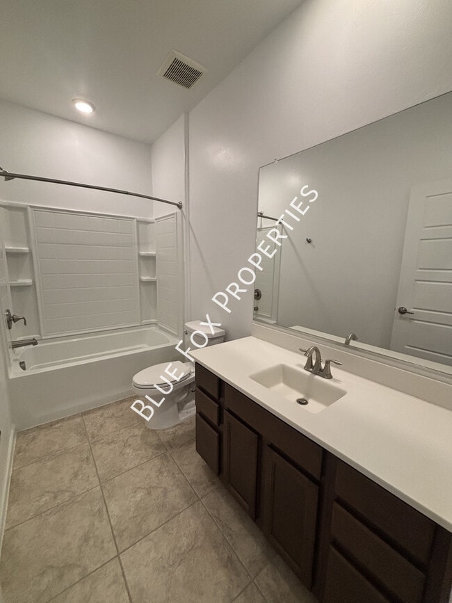 Building Photo - 7095 W Jadewood Ln