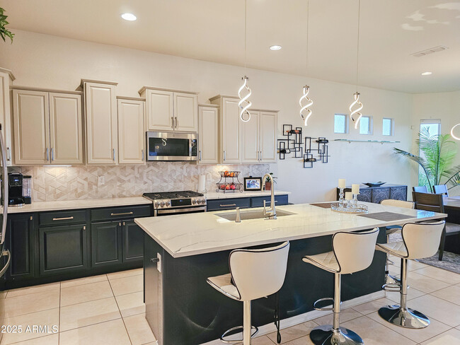 Building Photo - 5947 E Sienna Bouquet Pl