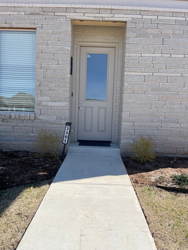 Building Photo - *Fully Furnished* 4 bedroom, 2.5 bathroom, 2 car garage Gated Neighborhood