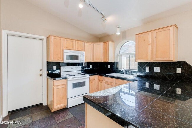 Building Photo - 9346 E Plana Ave