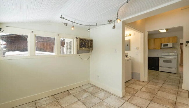 Building Photo - "Charming 2-Bedroom Retreat with Hardwood ...