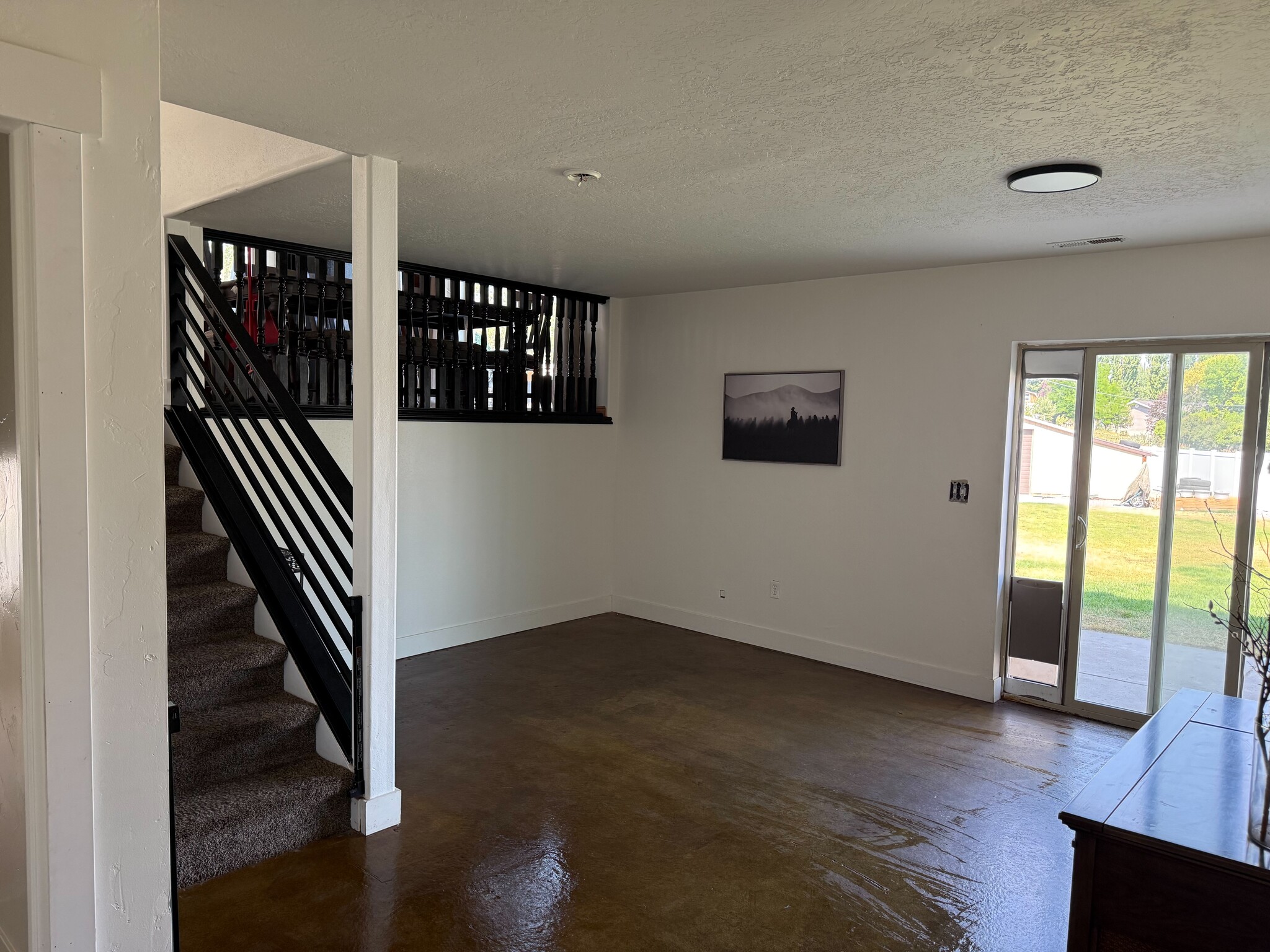Family room in basement. - 3835 S Main St