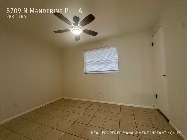 Building Photo - 8709 N Mandarine Pl