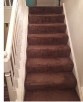 Stairs from landing to bedrooms - 18892 S Vanderbilt Dr