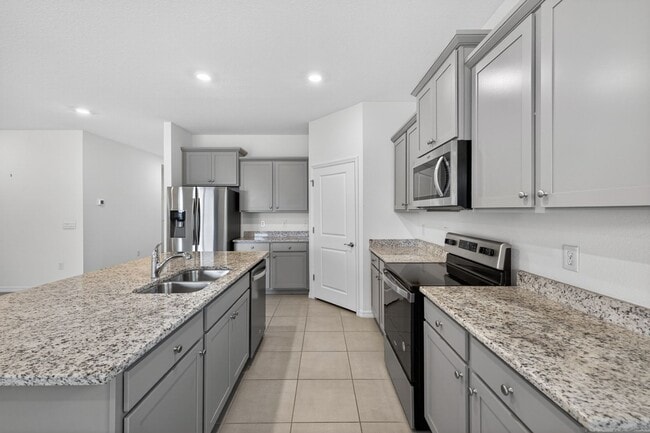 Building Photo - 4 Bedroom in Gated Community!