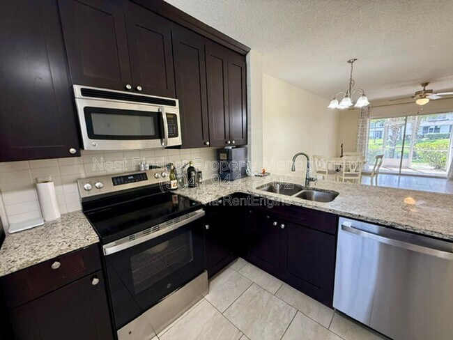 Building Photo - 12311 Kensington Lakes Dr
