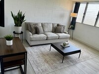 Building Photo - Upgraded Fully Furnished Condo w/ Assigned...