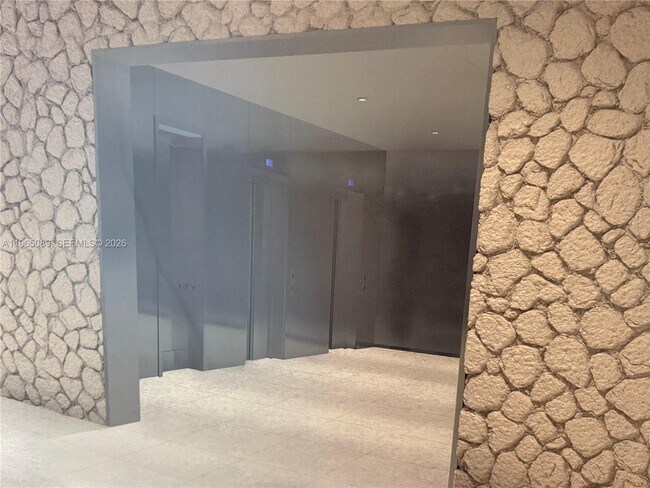 Building Photo - 5555 Collins Ave