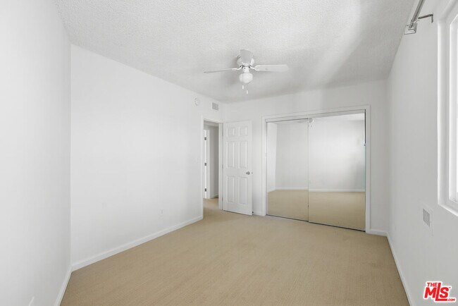 Building Photo - 8401 Tuscany Ave