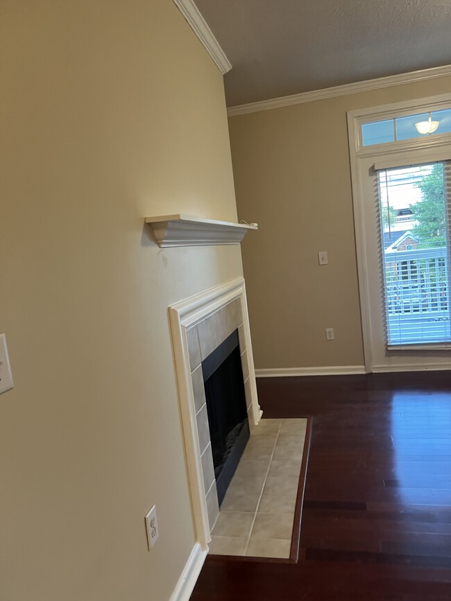 Living room fireplace. - 45 Sycamore Ave