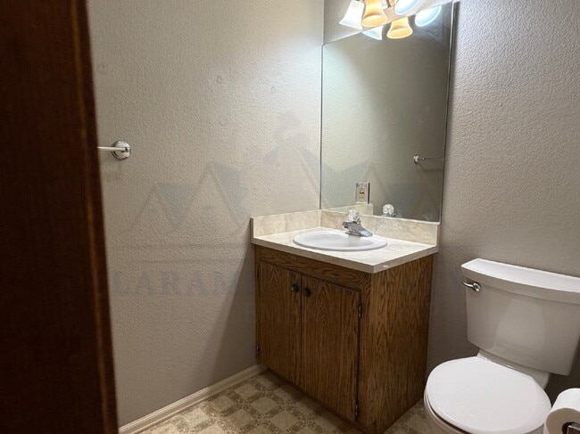 Building Photo - Single-Level 3-Bedroom Townhome with Primary Suite & Attached Garage