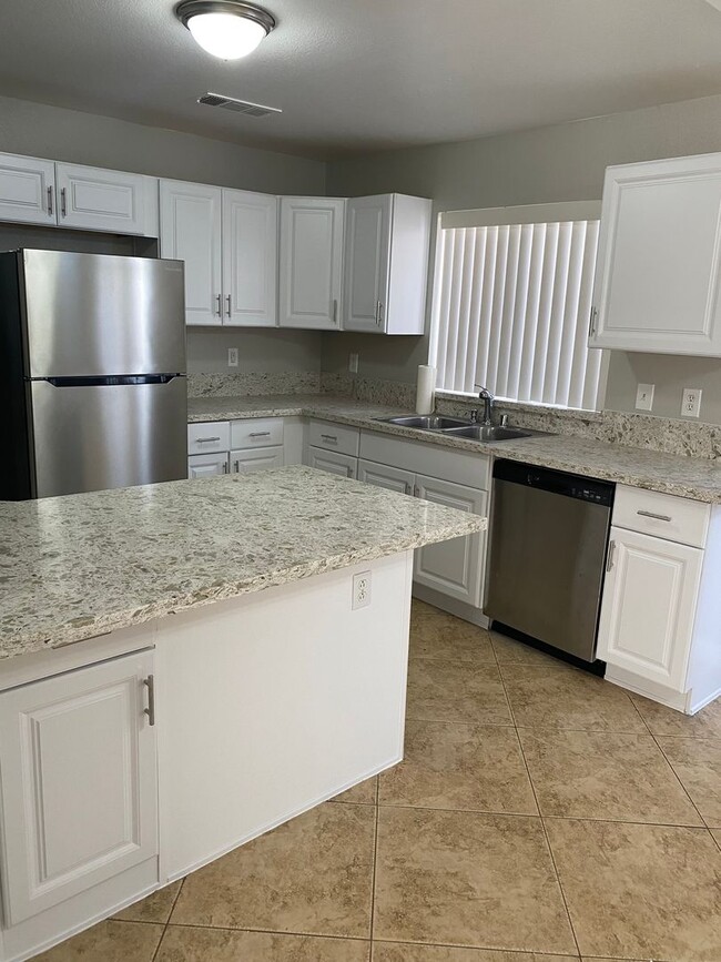 Building Photo - AMERICANA Property Mgmt - Remodeled 2 story 3 beds house in Desert Pines