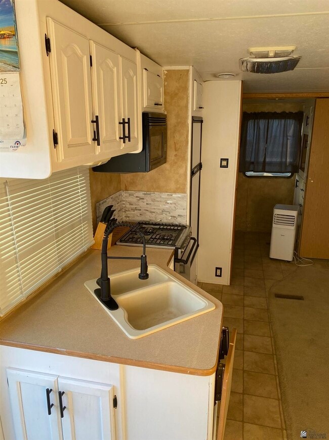 Building Photo - 12617 E 46th Dr