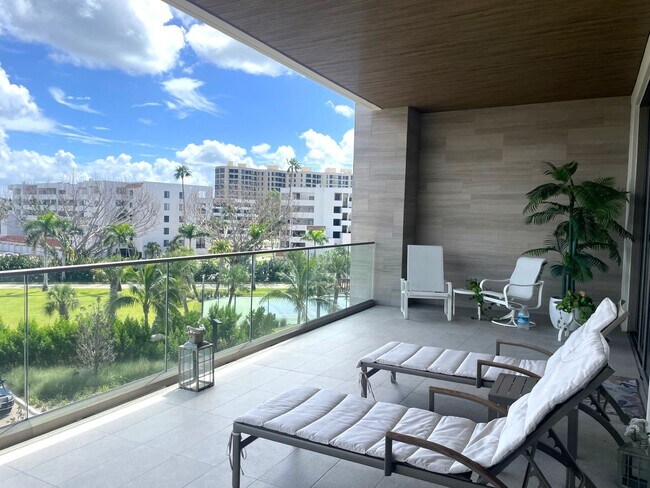 Building Photo - Luxury Furnished Gulf-Front Condo at The St. Regis Residences, Longboat Key, FL