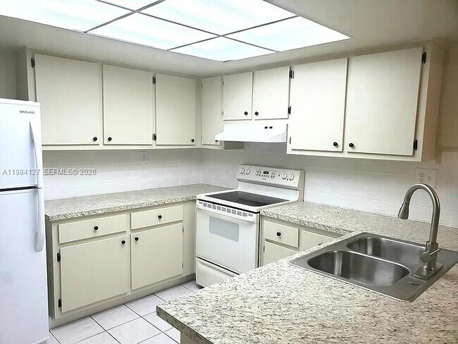 Building Photo - 10885 NW 7th St