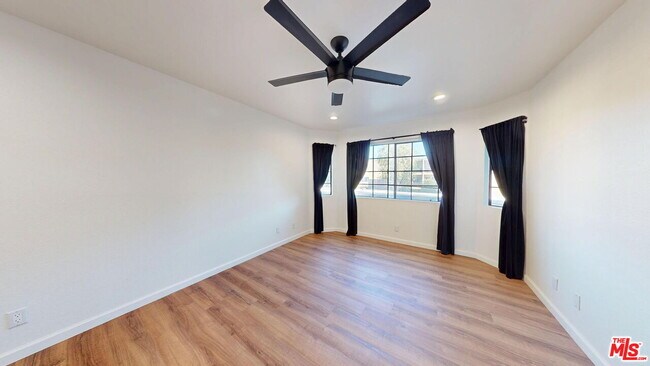 Building Photo - 10220 De Soto Ave