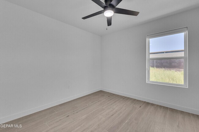 Building Photo - 5981 Ruidoso Downs St