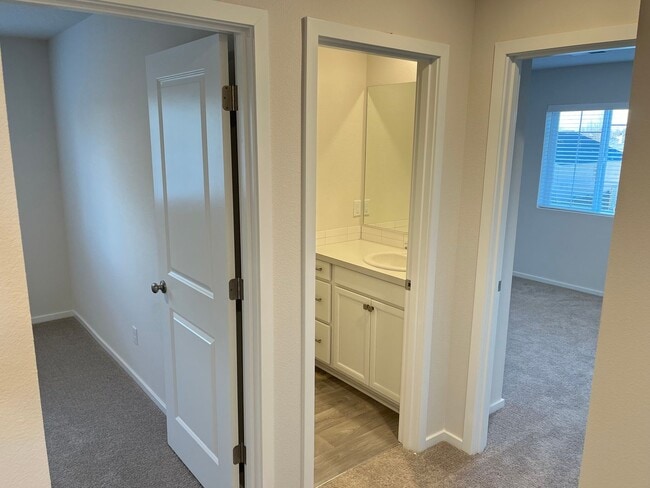 Building Photo - New Construction! Four Bedroom Home in Woo...