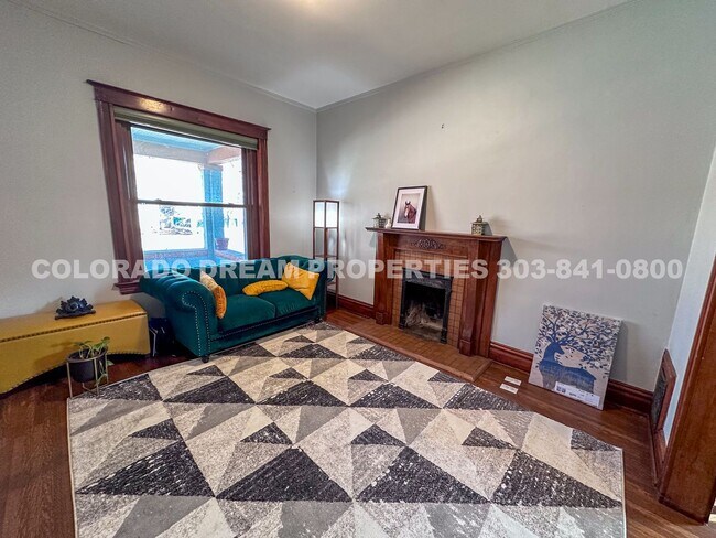 Building Photo - A home where old-world charm meets modern sophistication!