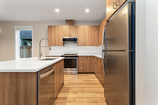 Building Photo - 2022 Build -Almost Brand New 3 br 2.5 bth Home with hardwoods, fenced yard and backs to greenspace !