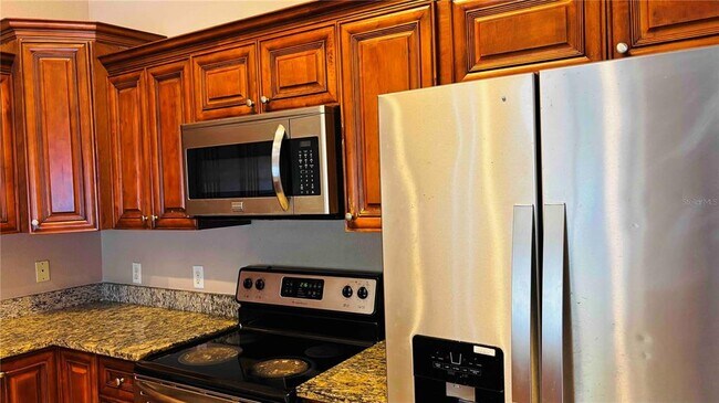 Building Photo - 9410 Citrus Glen Pl