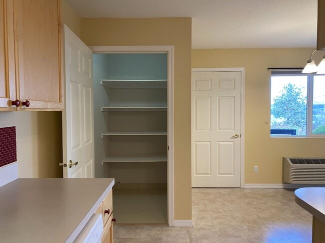 Building Photo - Ground Level River View Condo