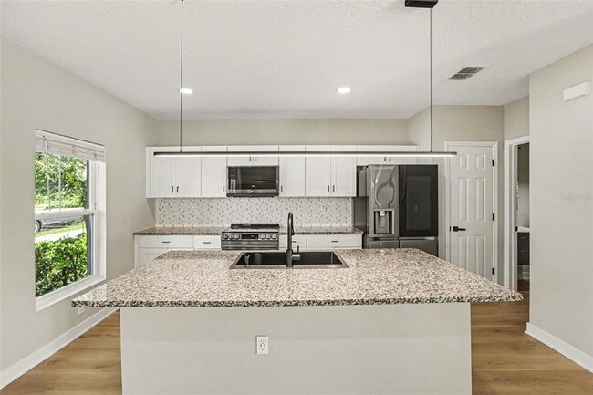 Building Photo - 12531 Triple Creek Blvd